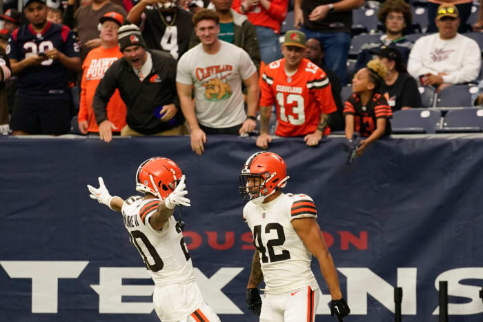 Tony Fields and Greg Newsome celebrate Fields' touchdown in the Browns' win over the Texans